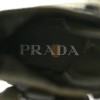 PRADA SPAZZOLATO ROIS RE-NYLON METAL TRIANGLE LOGO MONOLITH POUCH POCKET 55MM BOOTS 38 MILITARE