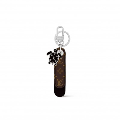 LOUIS VUITTON DRAGONNE TAB KEY HOLDER AND BAG CHARM M02566