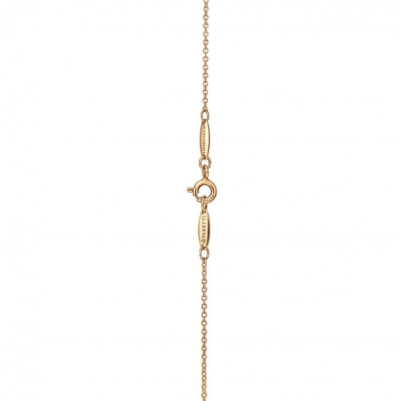 TIFFANY  ELSA PERETTI® OPEN HEART PENDANT IN YELLOW GOLD WITH RUBIES, 16 MM