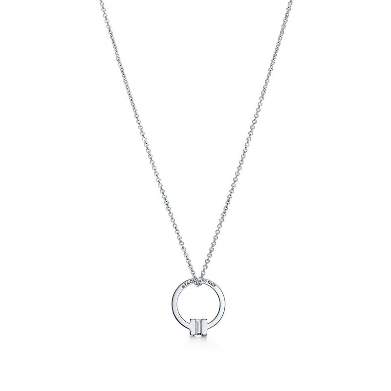 TIFFANY T PENDANT IN 18K WHITE GOLD WITH A BAGUETTE DIAMOND